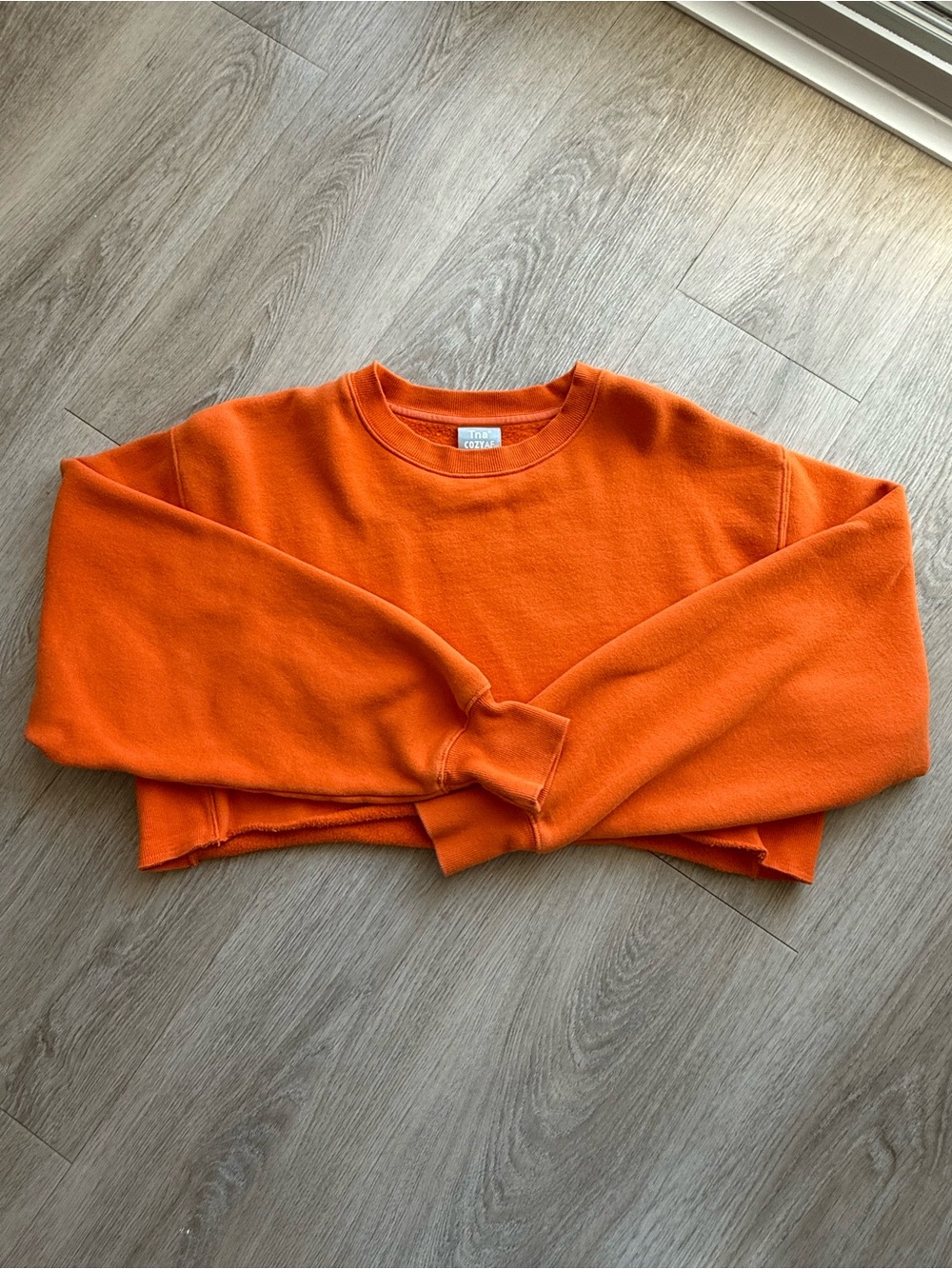 TNA Women's Vibrant Orange Cropped Crewneck Sweater